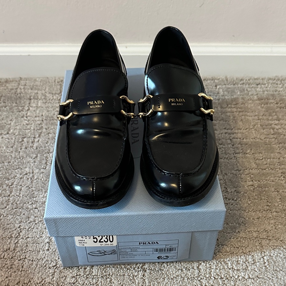 Prada Women’s Black Loafers with Gold Accents